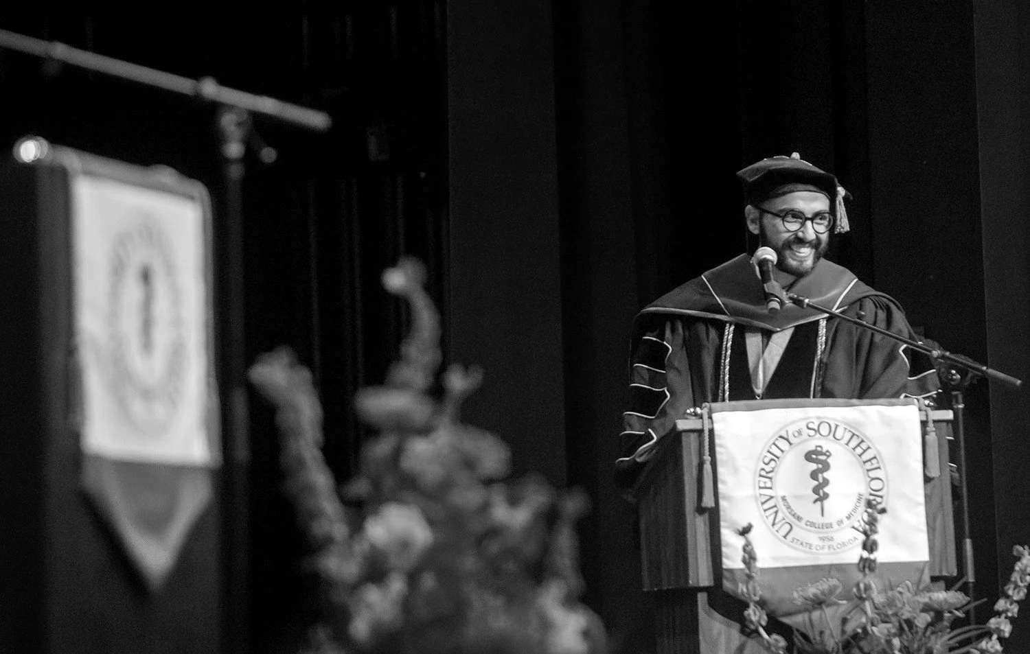 Karim Hanna at USF graduation ceremony in academic regalia